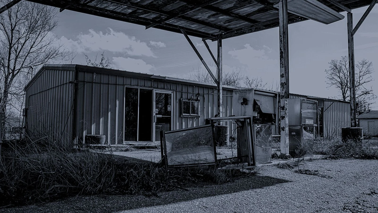 The Highway That Hunts — Scene 4: The Abandoned Petrol Station & Locked Storage Room - The Highway That Hunts Horror Movie Scene Still 4K Wallpaper